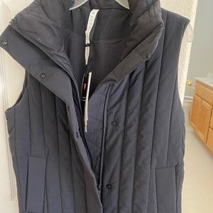 Lululemon water repellent insulated vest with tag. Size 4. Price is firm.